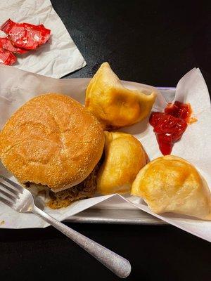 Pulled pork sandwich and homemade pierogies