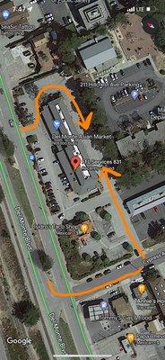 Drive around the building or turn onto Cypress and turn up the hill and the shop is in the back.