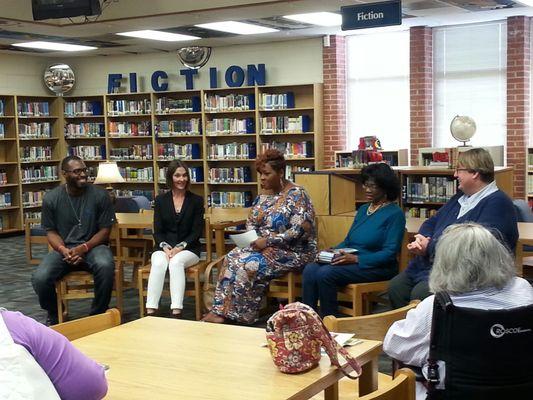 A panel of authors and local TV host Henny Stewart talking about diversity in literature for young readers.