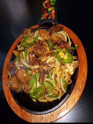 Spicy carnitas fajitas