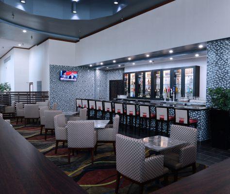 Featuring a full bar with 2 large screen TV's and a wide selection.