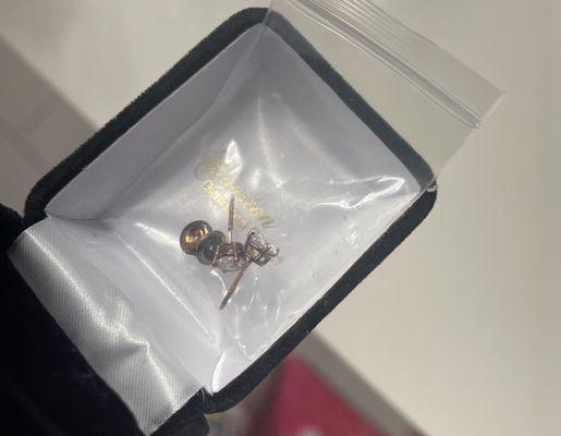Photo of box and fake gold earrings