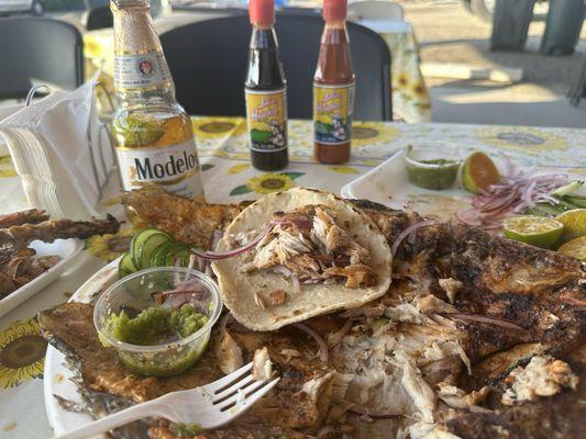 My pescado zarandeado feast enjoyed with a beer