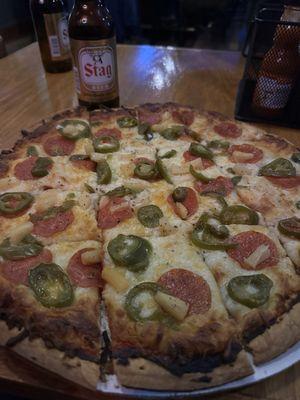 Pepperoni jalapeño and pineapple pizza