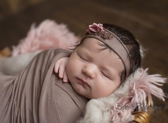The best time to photograph newborns is between 5-10 days old.  Don't wait until your baby is born to book your session.