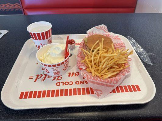 Spicy chicken sandwich and fries and ice cream