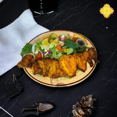 A tender Cornish hen, marinated and skewered, then charbroiled to perfection.