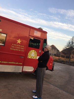 Hubby by the truck, as seen in the movie Like a country song, starring Billy Ray Cyrus!