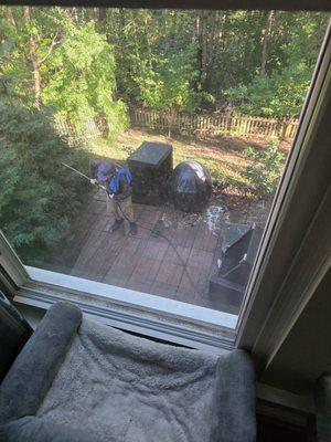 He is cleaning our fireplace.