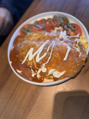 Smothered omelet. Red chili gravy is on the left and the green is on the right in this photo.