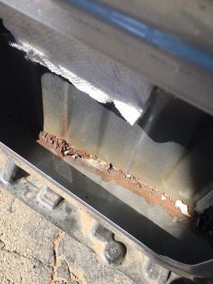 Metal shavings and rust that was already embedding into the painted surfaces. The screws would have rattled constantly...