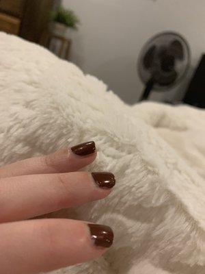 Chipped nails and nails not painted to full extent of nailbed