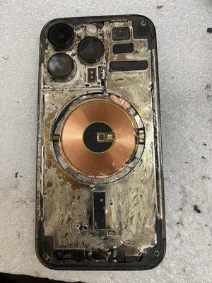Glue scraped away after it was fixed at a different phone repair place.