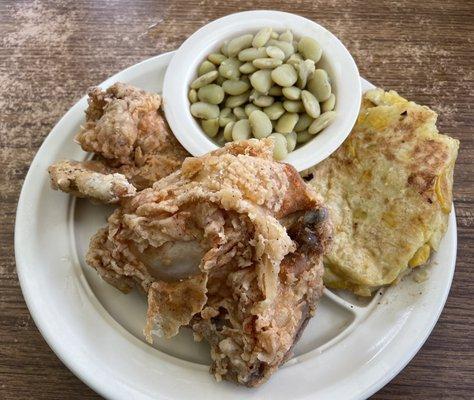 Southern fried chicken with a squash fritter and butter beans