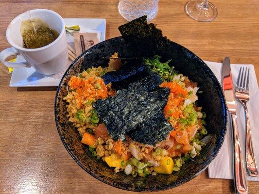 Poke bowl: salmon, tuna, mango, sweet pickled cucumber and carrots etc with yuzu dressing