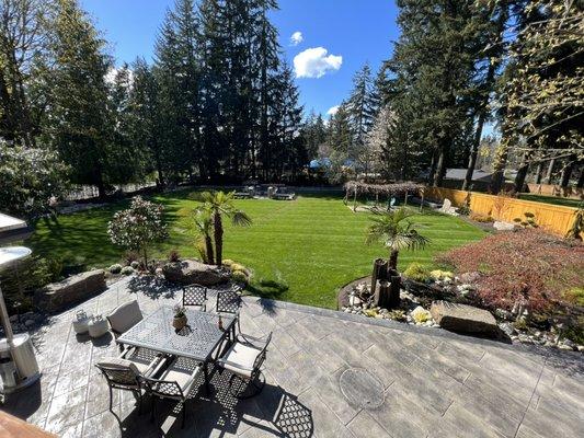 Stamped concrete patio with new lawn