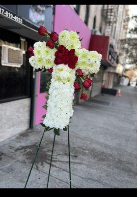 Cross funeral arrangement