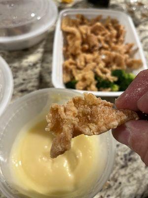 Coconut chicken? Dried chewy strips? Coconut pudding for dipping? I paid for all white meat, does this look like any meat?