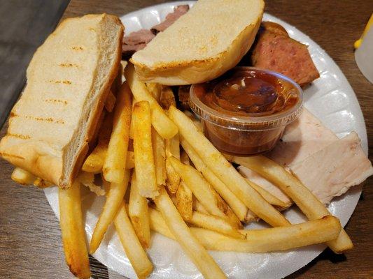 Brisket, Turkey, Smoked Sausage, roll, and fries