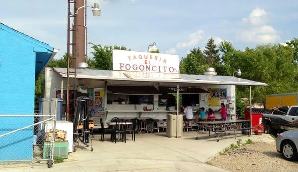 Front of place...kind of hidden behind the BLUE building..