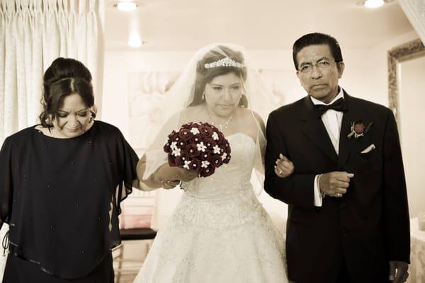 Bride and Parents getting ready to walk down the aisle