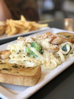 Shrimp fettuccine alfredo- delicious, shrimp are seasoned and flavorful, garlic bread is awesome!