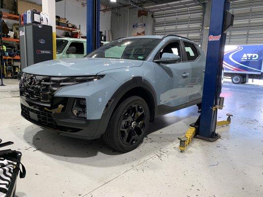 Wheels removed and powder coated, some chrome bits were wrapped gloss black to complete the look.