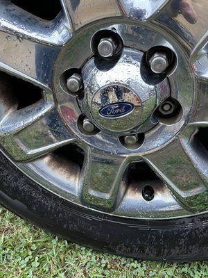 Missing two hub caps after they rotated and balanced my tires.