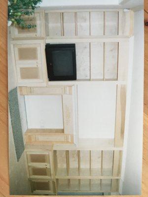 Here is a wall unit I did with recessed panel doors, open adjustable shelving above, and mantlepiece.