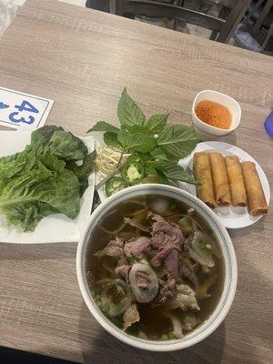 Pho tai nam gấu gần and egg rolls
