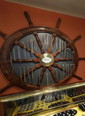 Ship's Wheel on the wall.