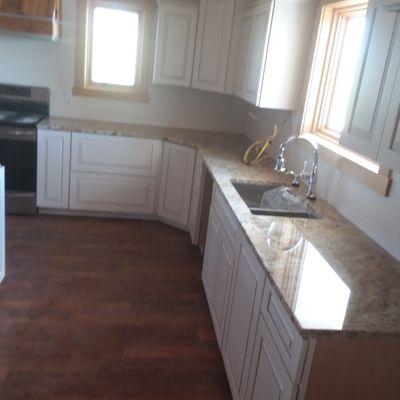 Kitchen Countertops in Snow Fall Granite.