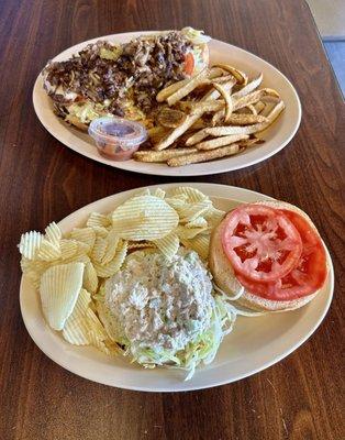 Top entree - Philly cheesesteak with fries $14.99, tuna fish salad sandwich $10.99
