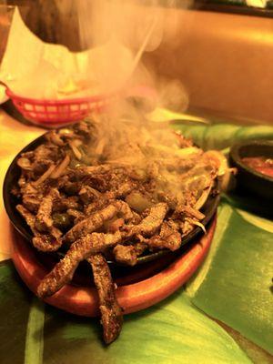 Steak fajitas just brought out to the table!