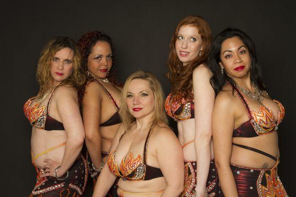 Some of Raksanna's Desert Flames, her professional troupe, sharing a moment