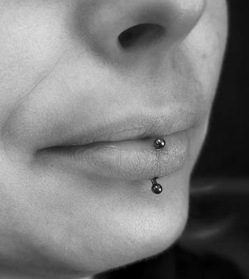 Modify Tattoos and Piercings