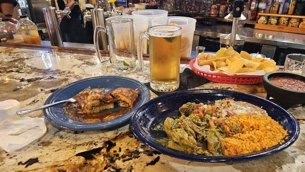 Carnitas with verde sauce and a tamal