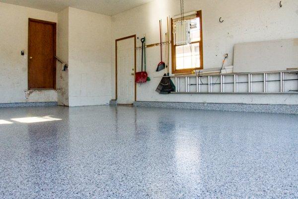An epoxy flake floor coating on a garage floor.