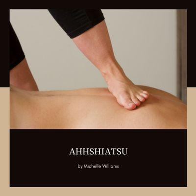 A bare foot performs a massage stroke on a person's back