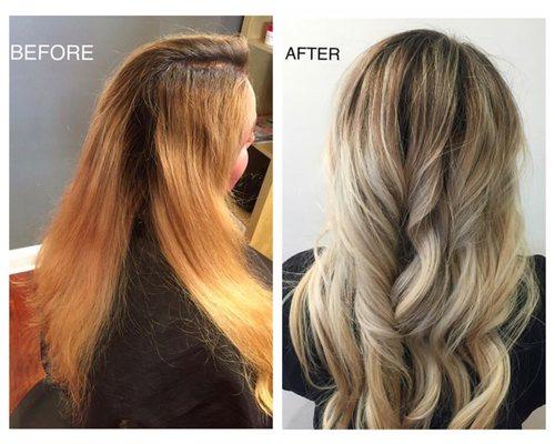 Extreme color correction. Transitioned over processed solid brassy blonde with dark line of roots, into a softer ombré platnium blonde.