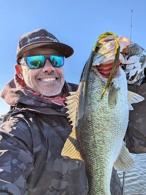 Captain McCoy catching a large Bass