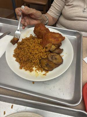 Jollof rice with plaintains and chicken
