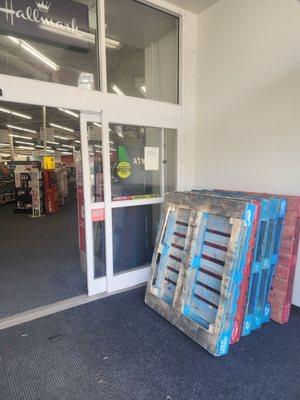 Welcome to CVS, We store wooden pallets in the entry way.