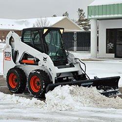 Bobcat with snow attachment