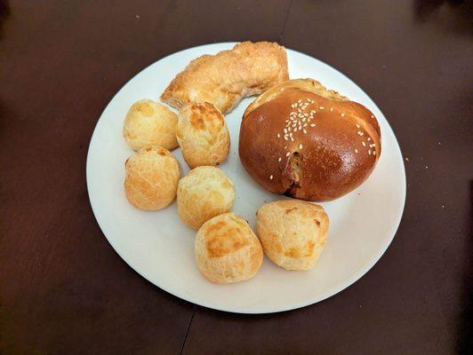 Pao de queijo, guava turnover, and chicken sfiha