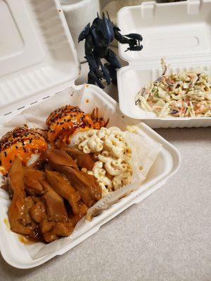 Teriyaki chicken lunch plate with a side of coleslaw