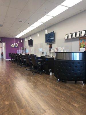 Clean nail stations facing nature and travel channels on flat screen TV's.