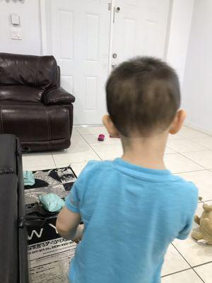 Back of his head sorry it's hard to catch a toddler on the move