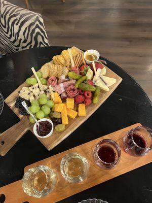 Charcuterie board and a blended wine flight