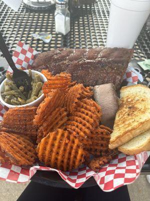 I got Ribs, Brisket green beans and sweet potato waffle fries.